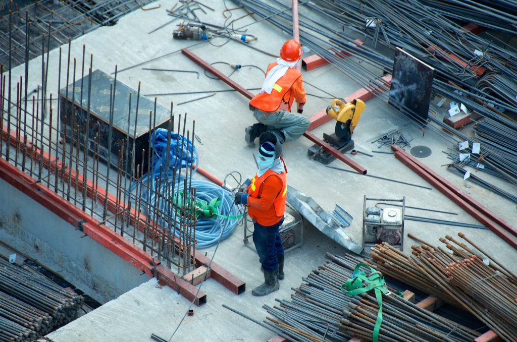 two men working on a construction site